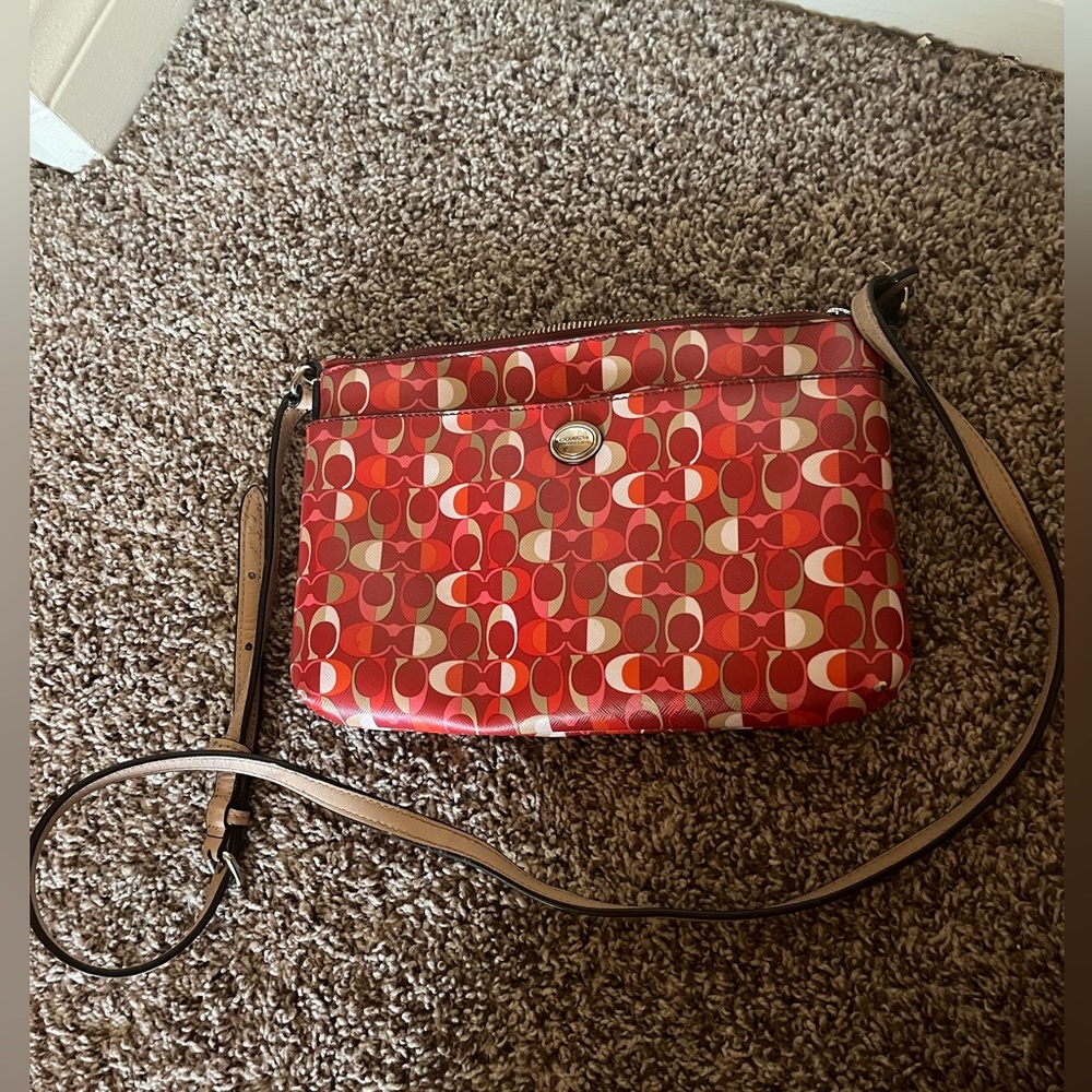Coach Purse with adjustable strap.